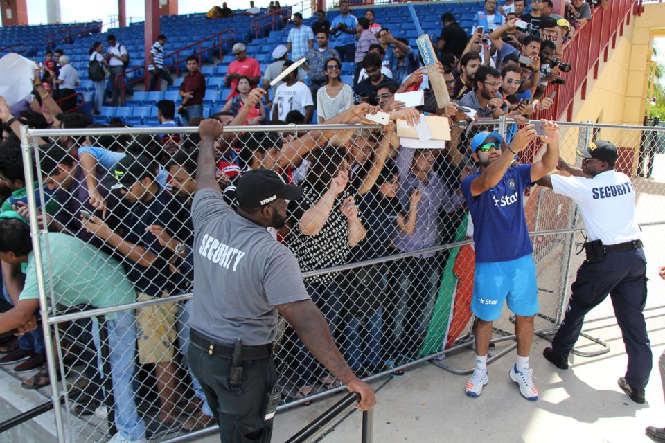 Fans pressing up against the security barriers? The Indian cricket team must be in town