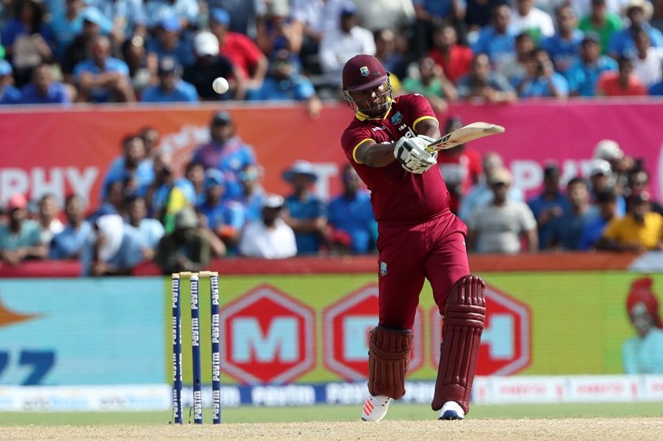 Johnson Charles' whirlwind 33-ball 79 gave West Indies a power boost after MS Dhoni opted to bowl