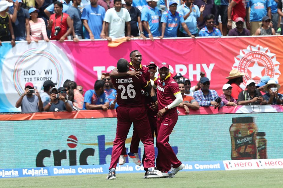 Prize catch: in a match where 12.22 runs were scored off each over on average, Bravo conceded 9.25 (and took two wickets)