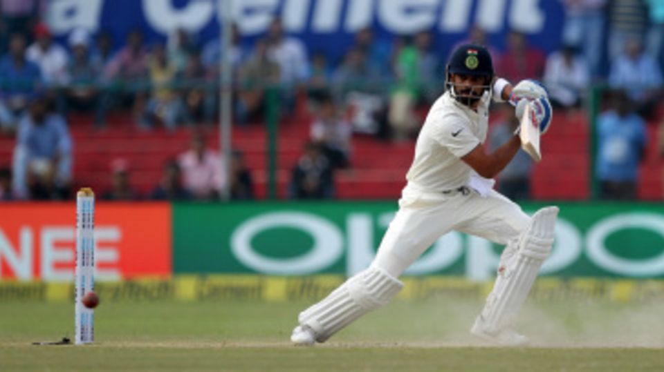 Virat Kohli plays behind square