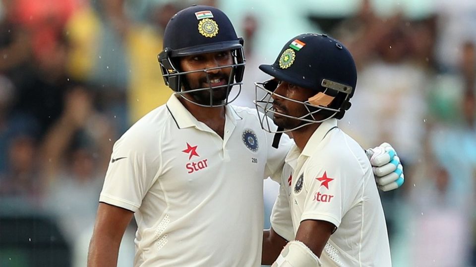 Rohit Sharma and Wriddhiman Saha buckled down to add 103 for the seventh wicket
