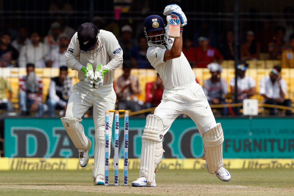 Rahane couldn't be budged from the crease though. He raised his eighth Test hundred