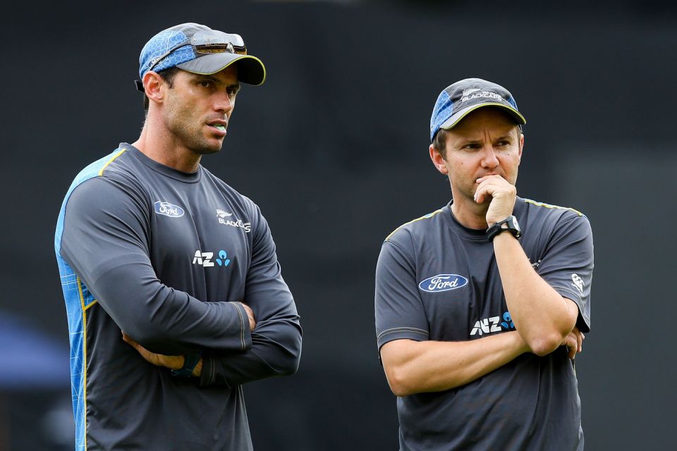 Donaldson chats with coach Mike Hesson ahead of an ODI in Wellington, 2015