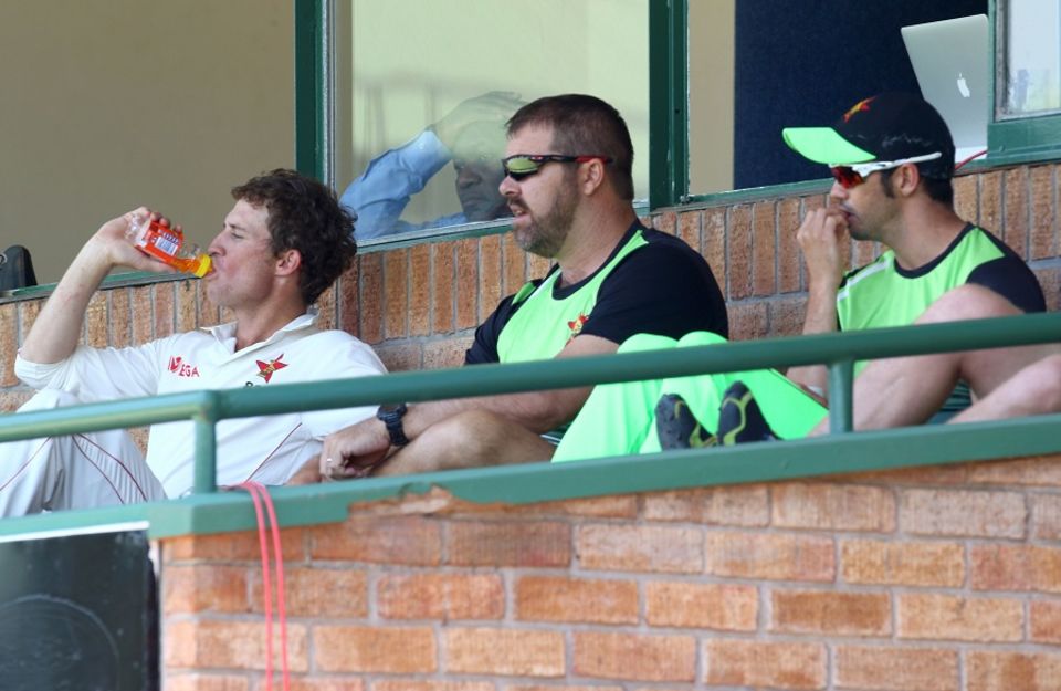 Hasnain will leave the job of improving Zimbabwe's away record to coach Heath Streak (centre), who "knows much more about cricket than I ever will"