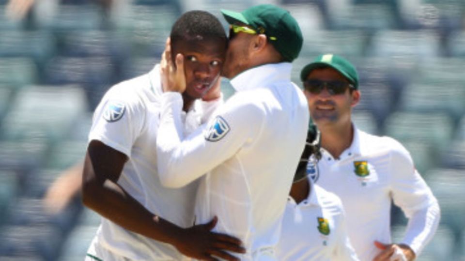 Faf du Plessis kisses Kagiso Rabada after the bowler took his fifth wicket
