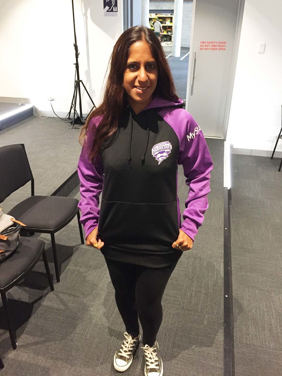 The author models her Hobart Hurricanes swag (added bonus: not likely to fall afoul of the dress code at the WACA)