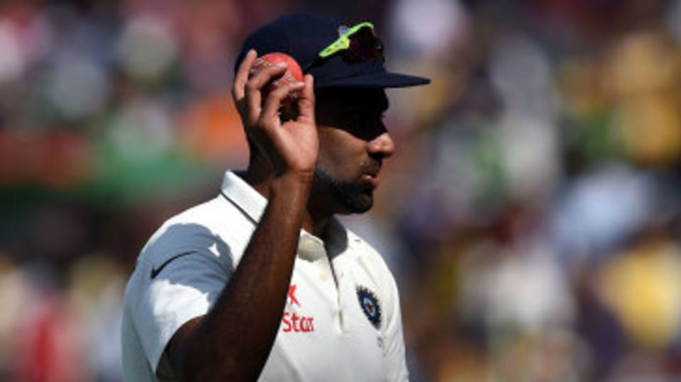 R Ashwin holds the ball aloft after another five-wicket haul