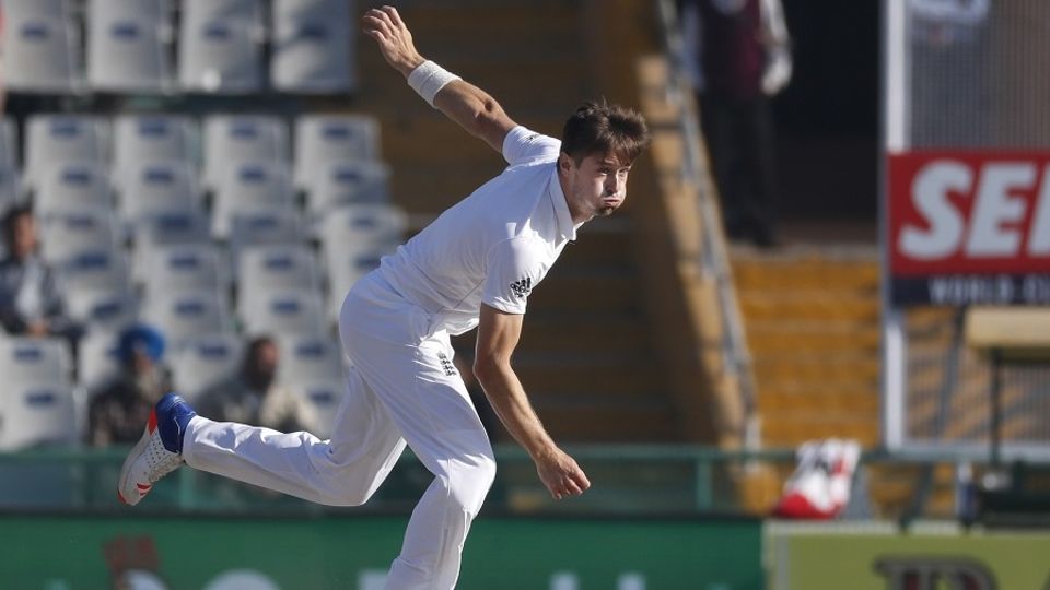 Chris Woakes exerts himself as he delivers the ball
