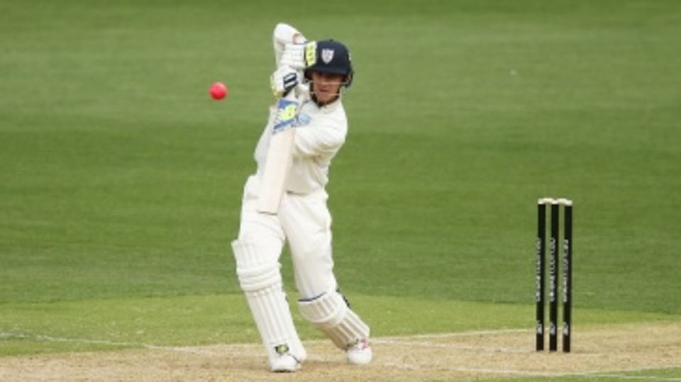 Nic Maddinson drives on his way to his 18th first-class fifty