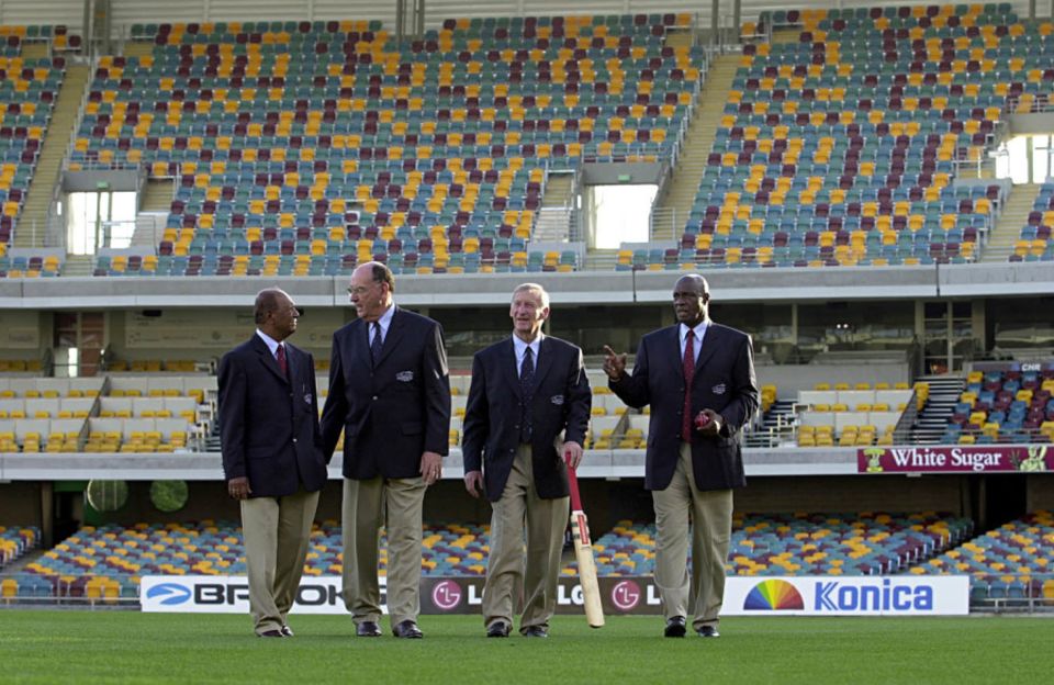 Joe Solomon (leftmost) precipitated the first tied Test when he caught Australia's Ian Meckiff (second from left) out of his crease with a direct throw at the stumps