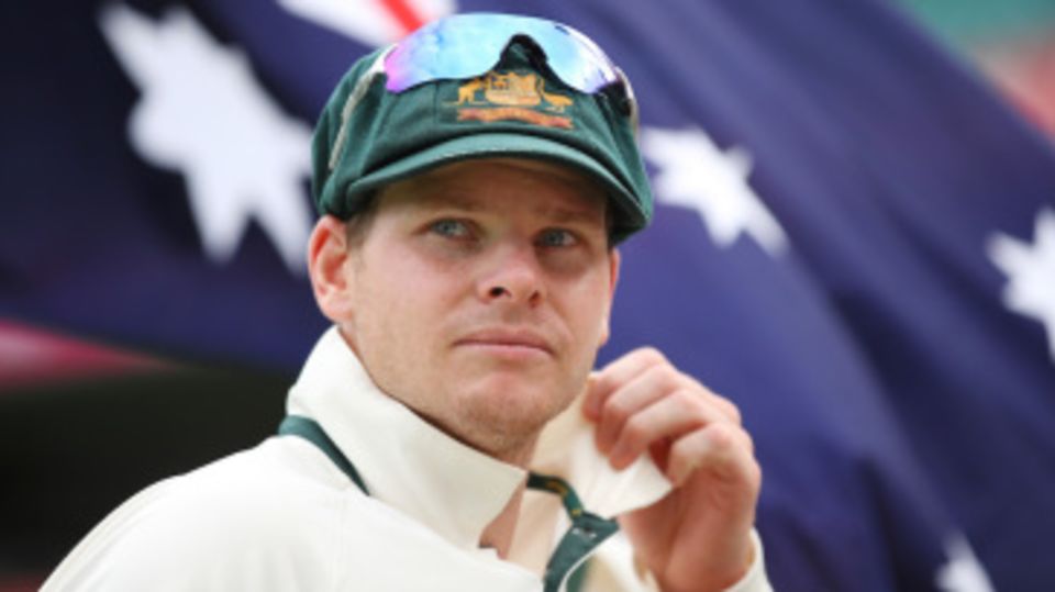 Steven Smith leads his team out