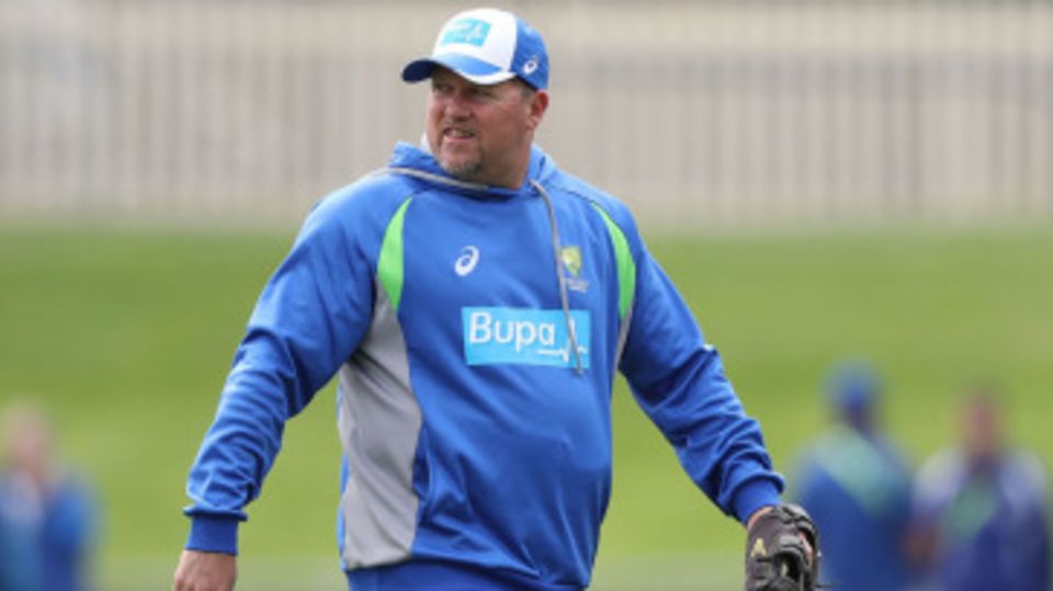 David Saker runs a warm-up drill prior to the start of play