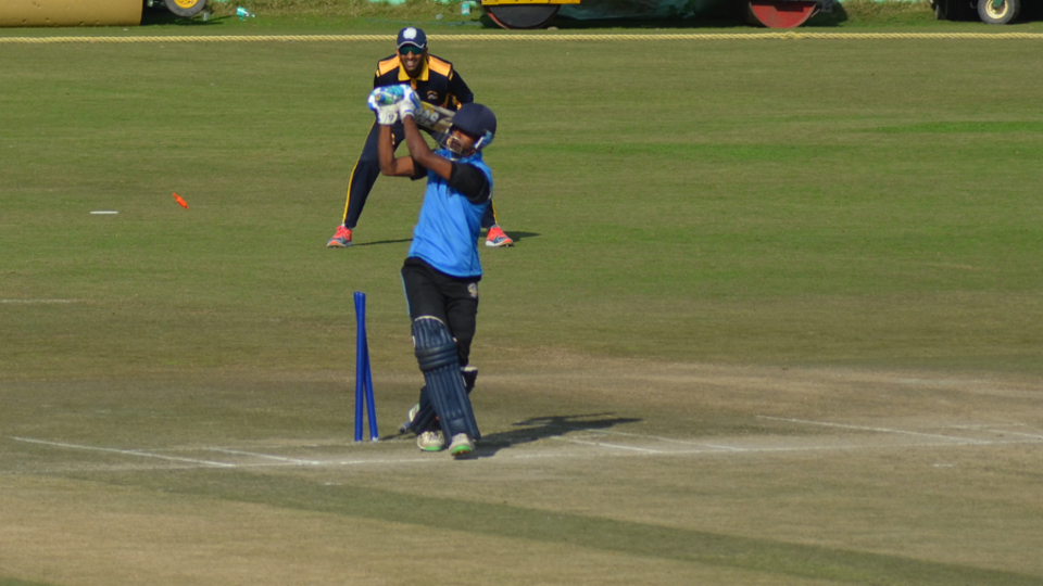 Manpreet Gony bowls Sachin Shinde in his four over spell of 13 runs and two wickets