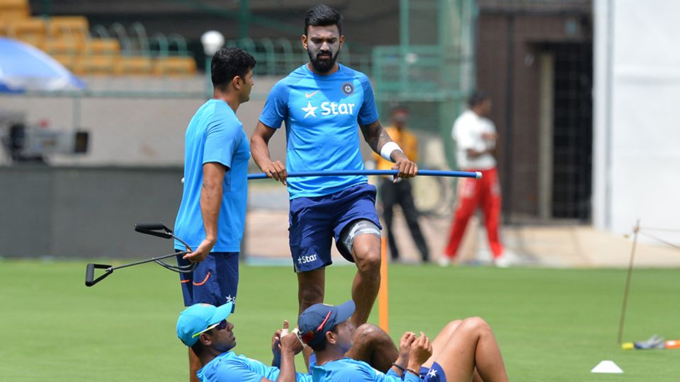 Indian players warm up during their practice session