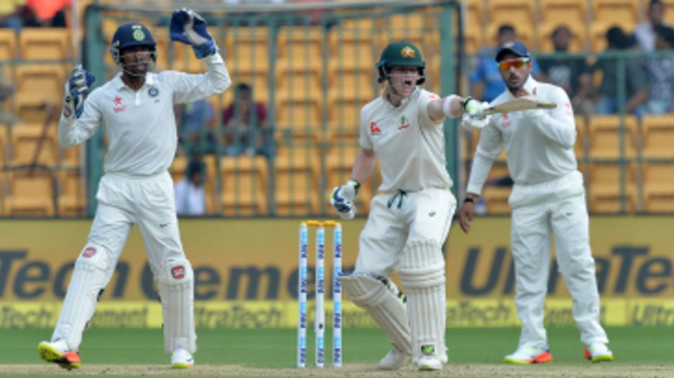 Steven Smith gestures at Matt Renshaw at the non-striker's end