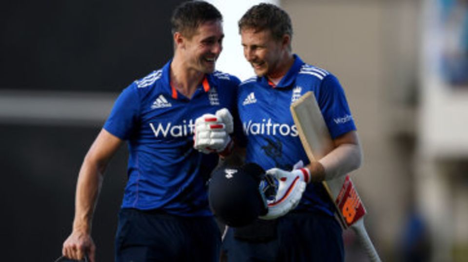 Chris Woakes and Joe Root saw England home