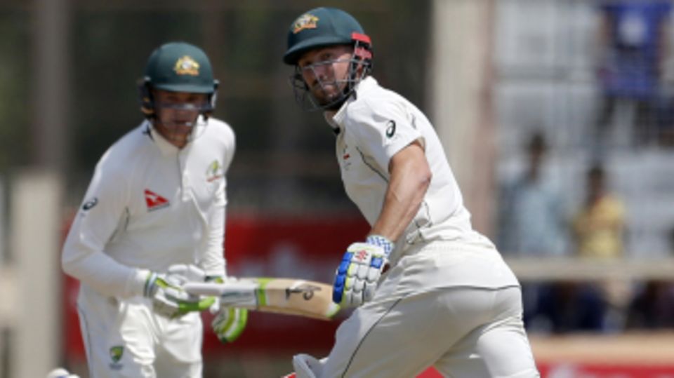 Shaun Marsh and Peter Handscomb run between the wickets