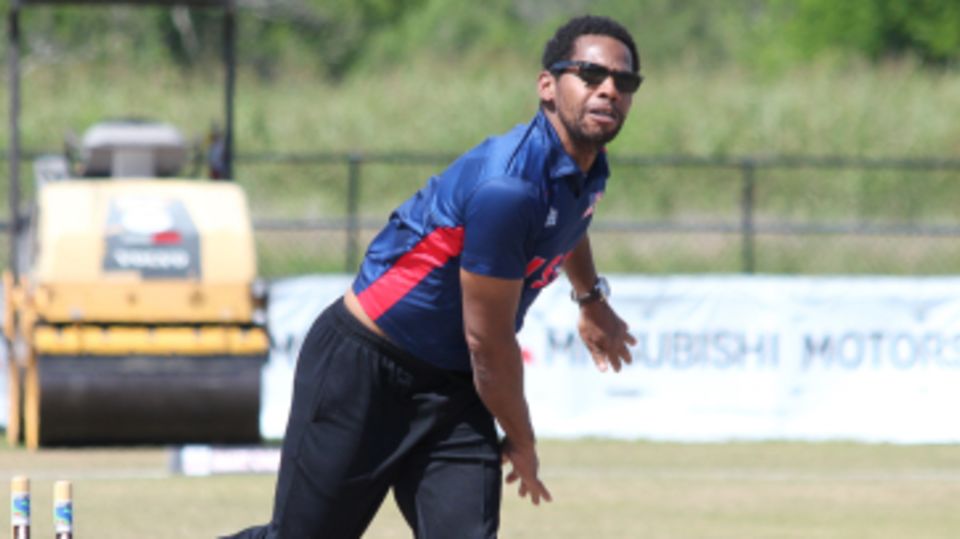 Camilus Alexander bowls during a training session
