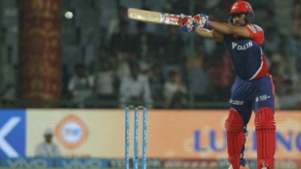 Karun Nair reaches out for the ball