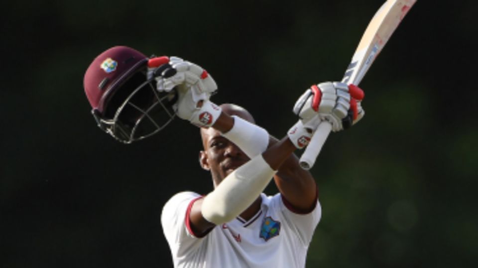 Roston Chase celebrates a fighting century