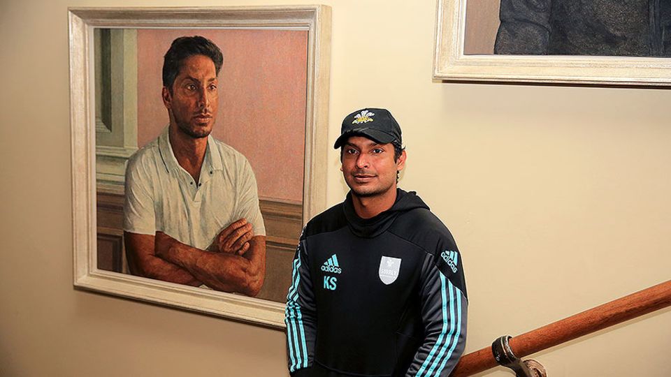 Kumar Sangakkara poses in front of his newly unveiled portrait in the Lord's Pavilion
