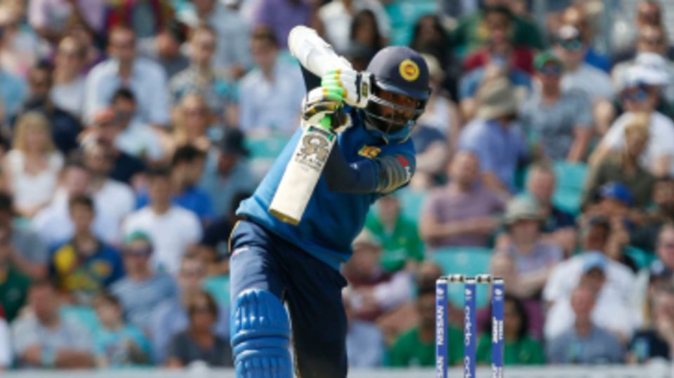 Upul Tharanga leans into a drive