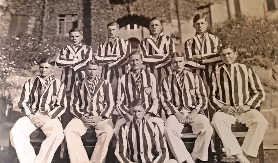 Mann (front row, second from right) with his school Michaelhouse's first XI in South Africa in 1937