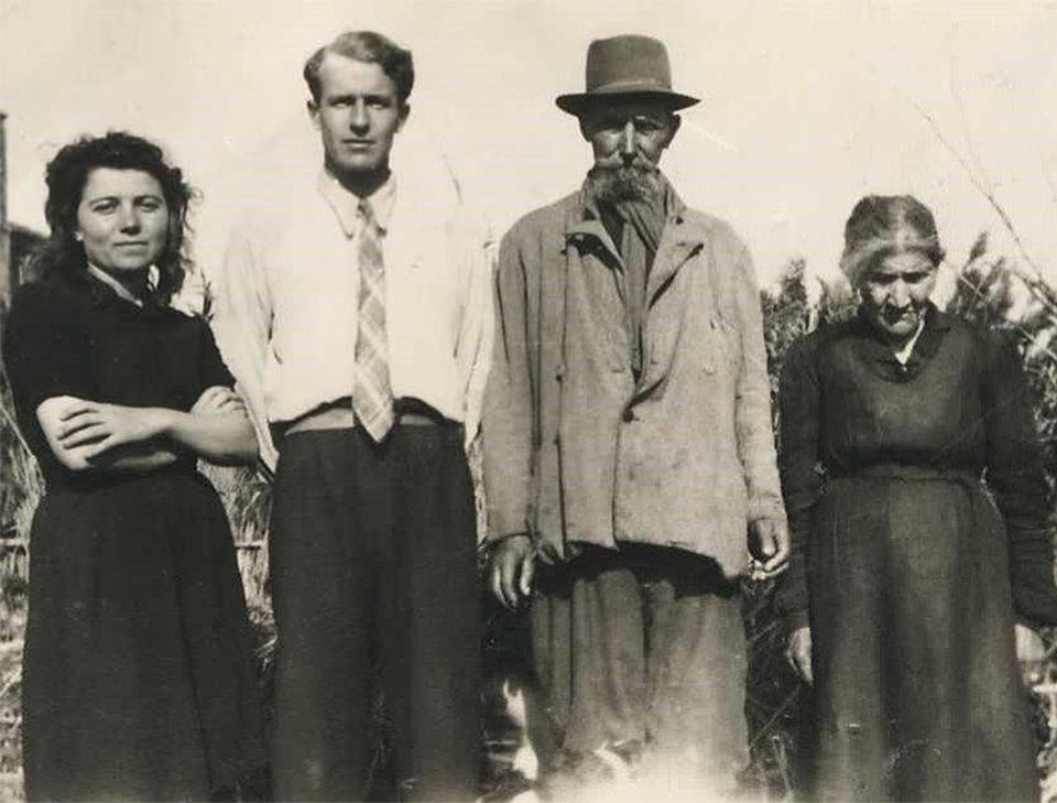 Mann with the Italian family that sheltered him during the war