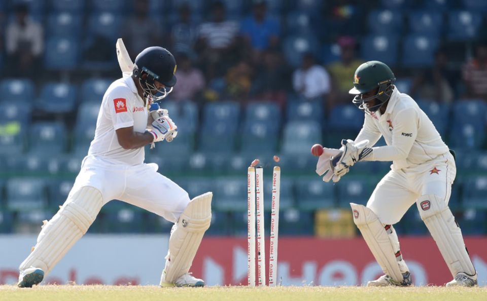 Dimuth Karunaratne was bowled by a delivery that spun back in sharply