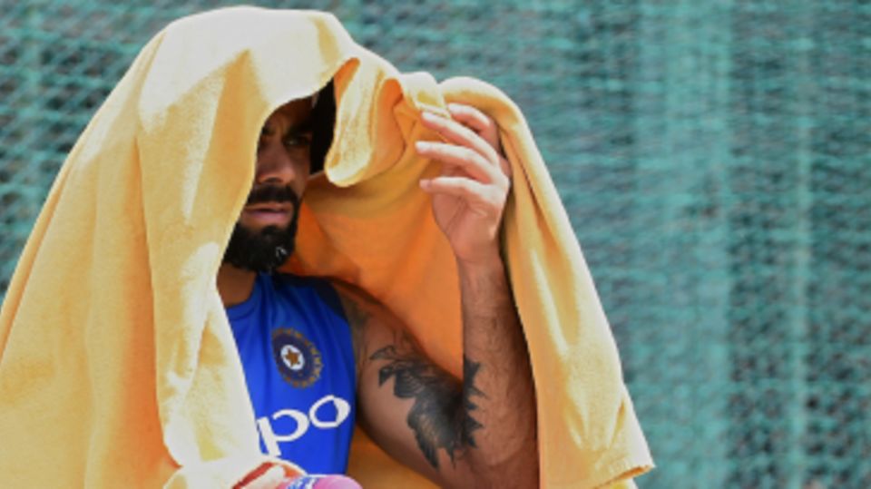 Virat Kohli tries to escape from the heat