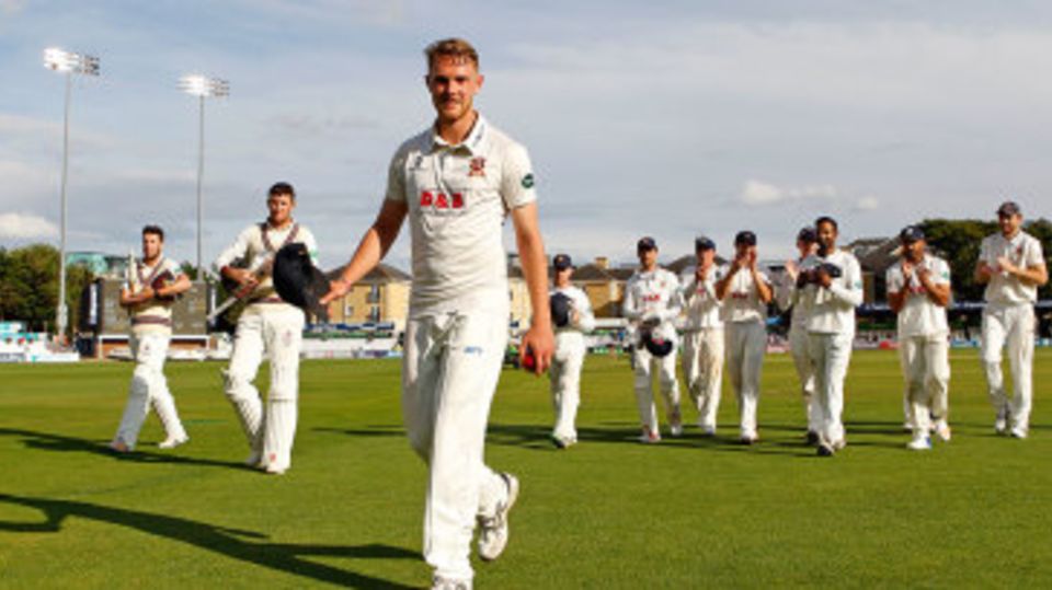 Jamie Porter leads Essex off after his match-winning 7 for 55