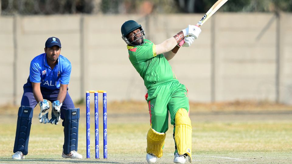 Patrick Matautaava drives down the ground during his 83 off 60 balls