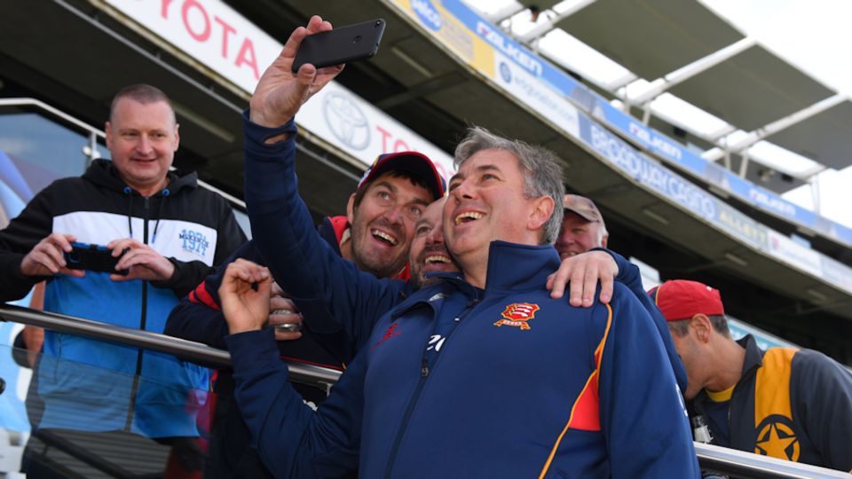 Essex coach Chris Silverwood poses with fans in 2017