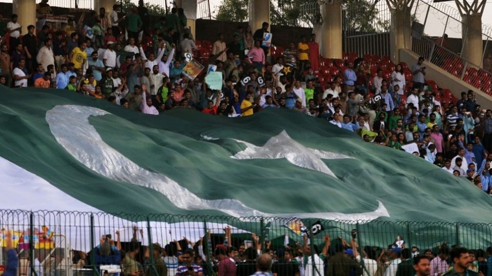 A gigantic Pakistani flag engulfs one of the stands