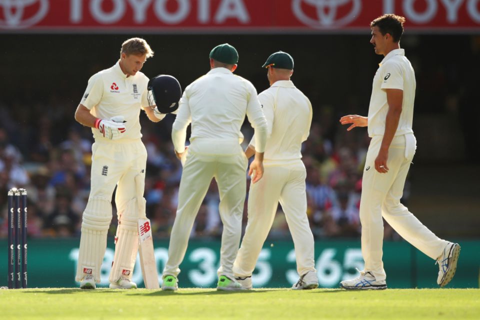 Joe Root needed a change of helmet after he was struck by a Mitchell Starc bouncer