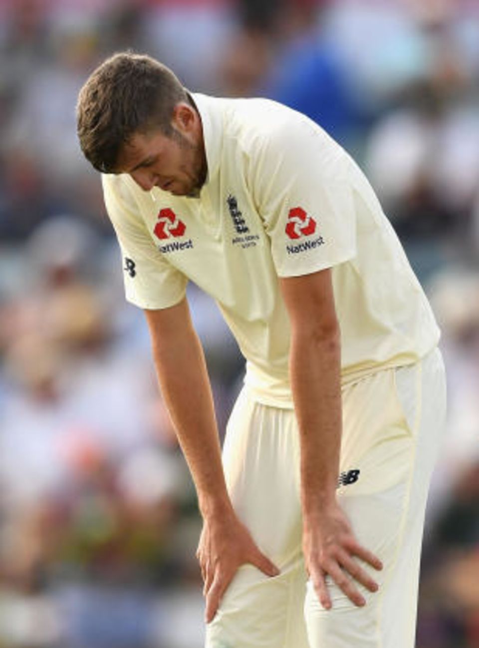 Craig Overton feels the pain of his cracked rib in the Perth Test