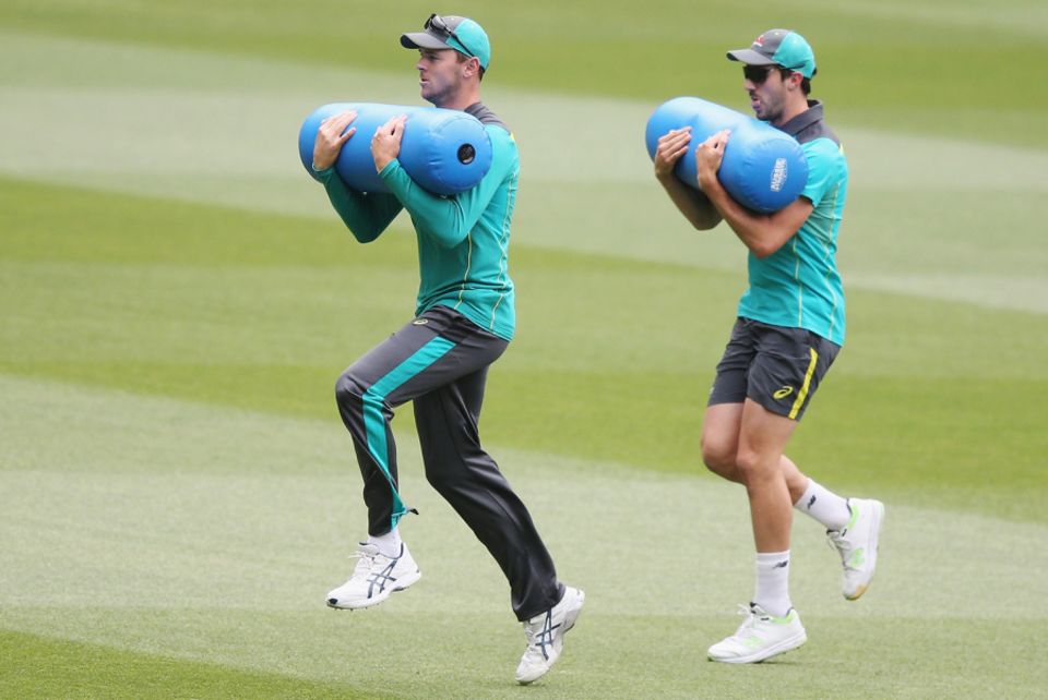 Josh Hazlewood and Pat Cummins at a training drill
