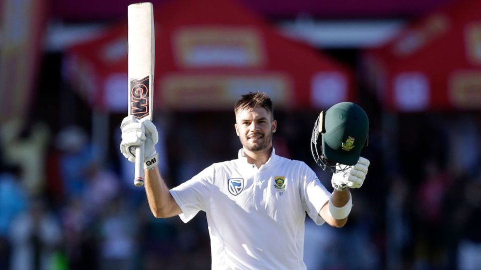 Aiden Markram manages a smile after reaching his century