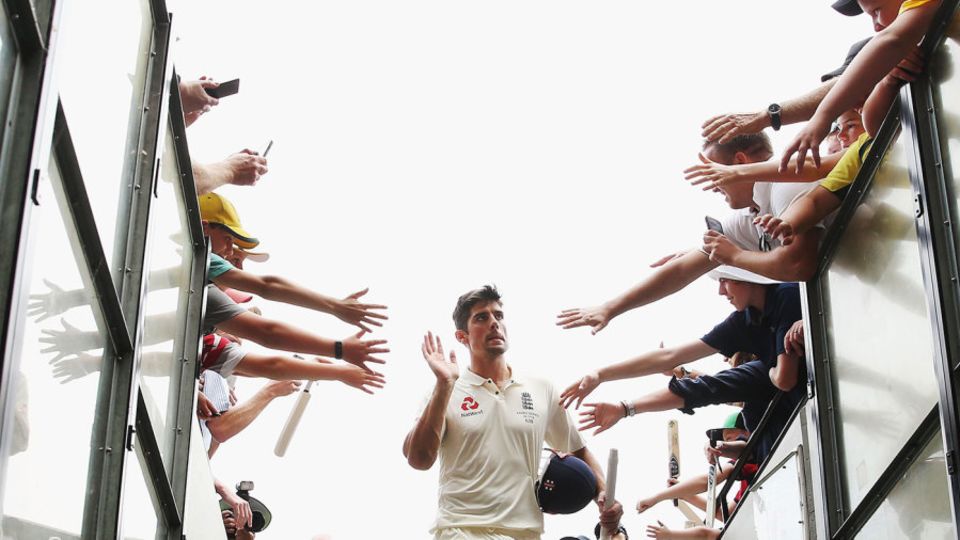 Alastair Cook takes the applause as he leaves the field