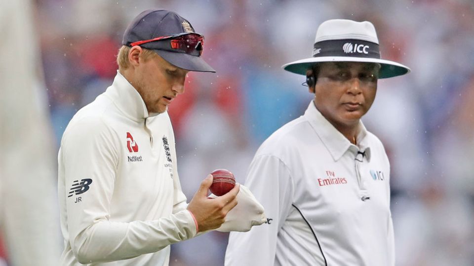 The umpires kept a close eye on the ball