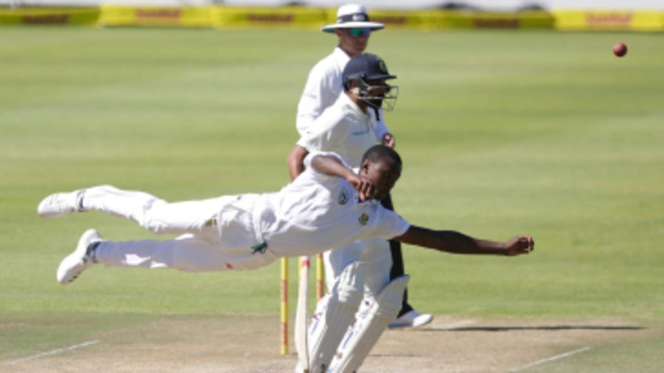 Kagiso Rabada is airborne while trying to field a ball off his own bowling