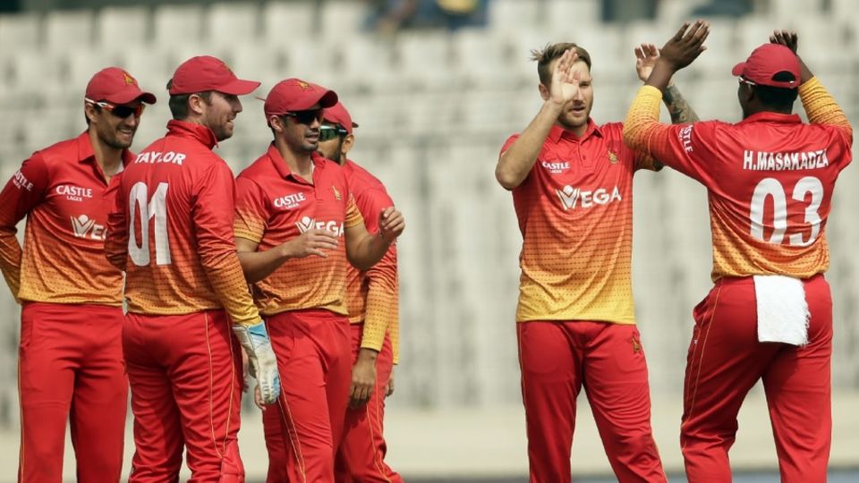 Kyle Jarvis celebrates Anamul Haque's wicket with his team-mates