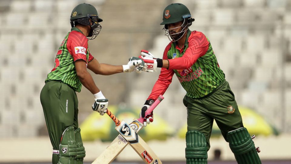 Tamim Iqbal and Shakib Al Hasan bump fists during their partnership