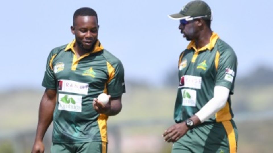 Kyle Mayers and Shane Shillingford have a chat