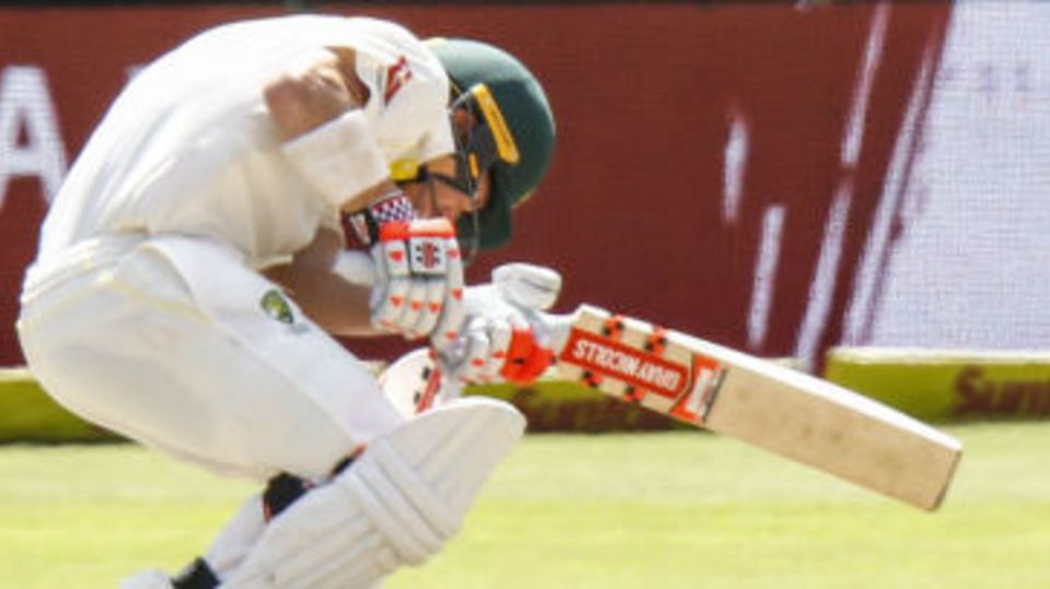 David Warner ducks under a fiery Kagiso Rabada bouncer