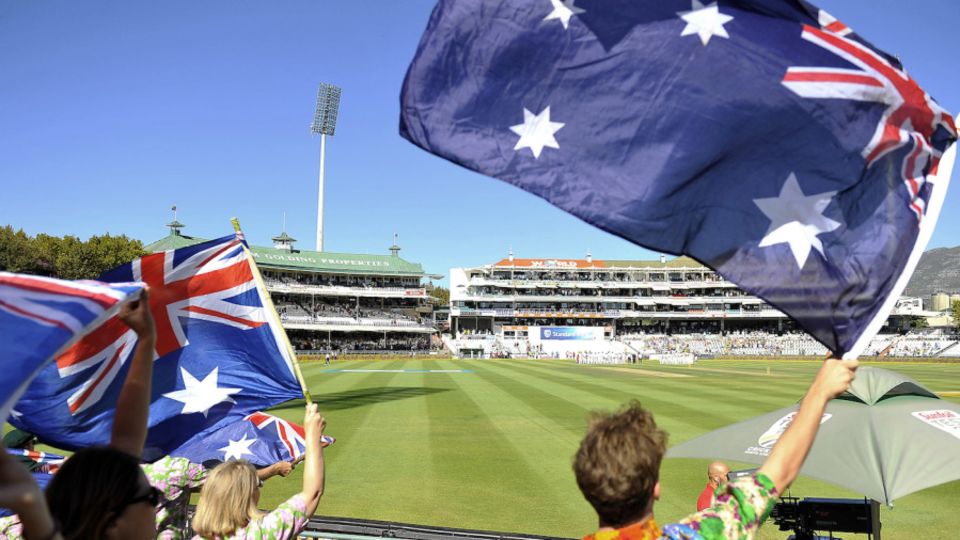 Spectators wave the Australian flag at Newlands
