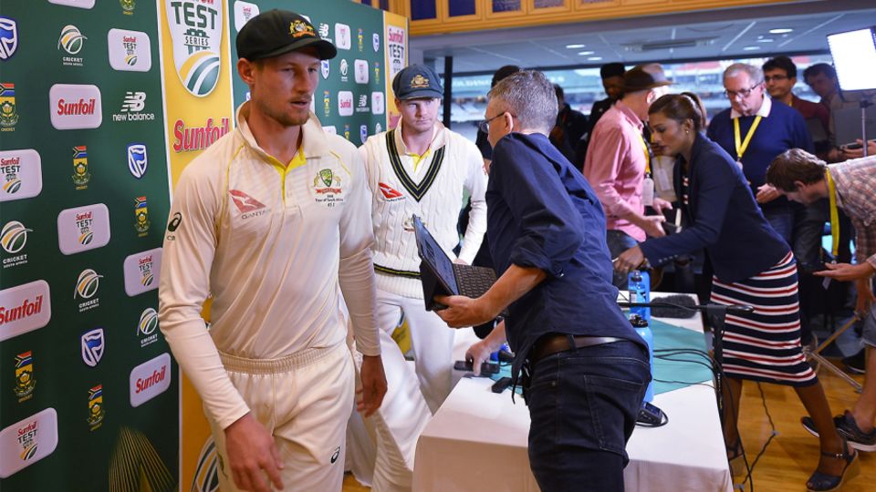 Cameron Bancroft and Steven Smith leave the press conference where they admitted to ball tampering