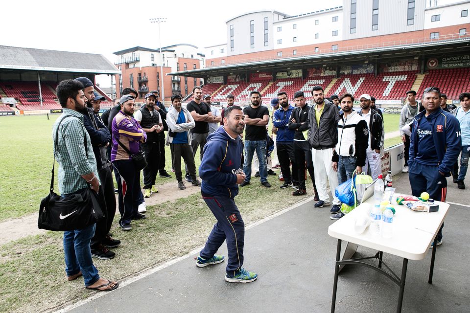 Arfan Akram (centre) explains the rules of the tournament to the participating teams at Leyton Orient