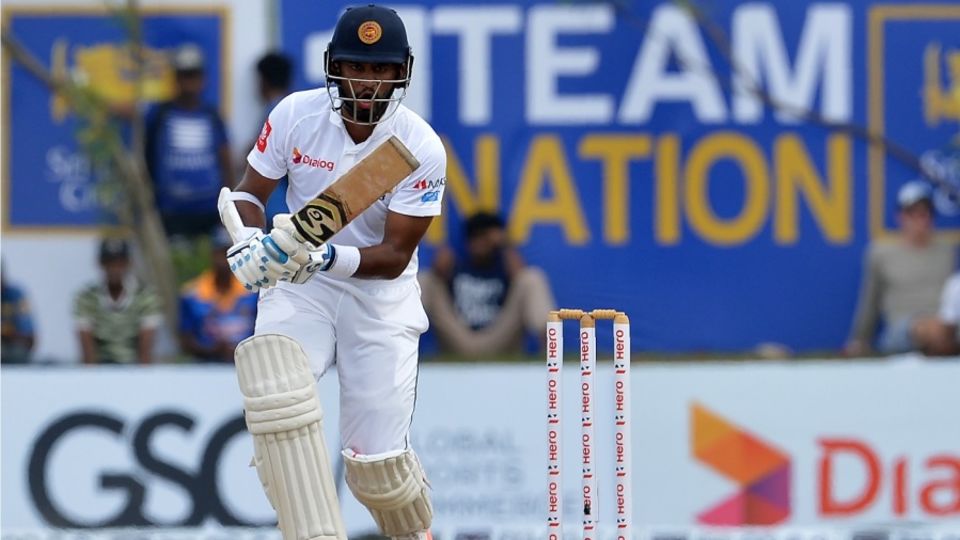 Dimuth Karunaratne drives with a straight bat