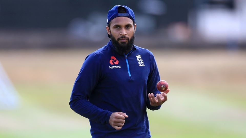 Adil Rashid prepares to bowl during a practice session